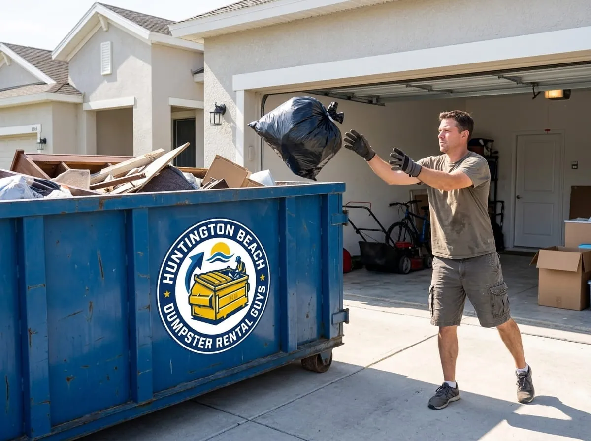 Worker beside a commercial roll-off dumpster from Huntington Beach Dumpster Rental Guys in Huntington Beach, CA